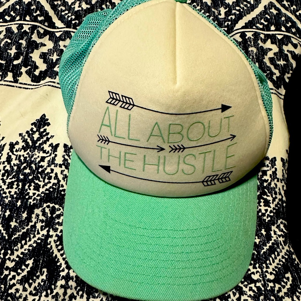 All about the hustle trucker hat